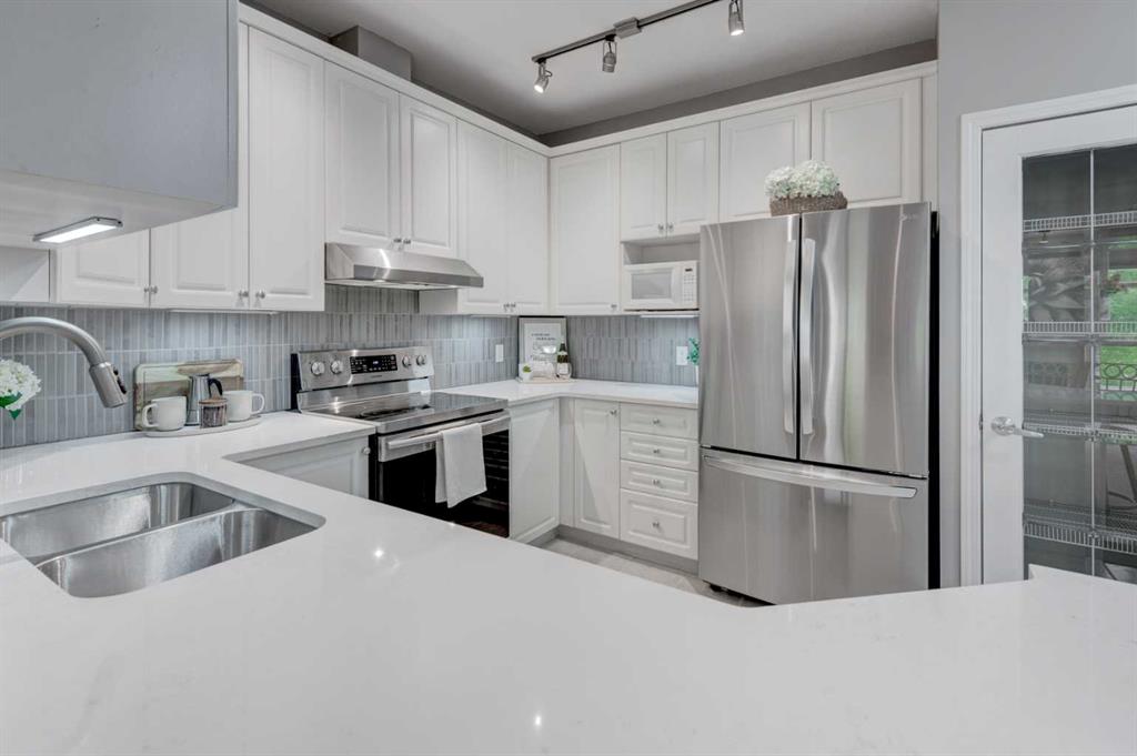 Fourth View of 1211, 1211 Lake Fraser Green SE, Lake Bonavista, Calgary, Alberta, T2J 7H6