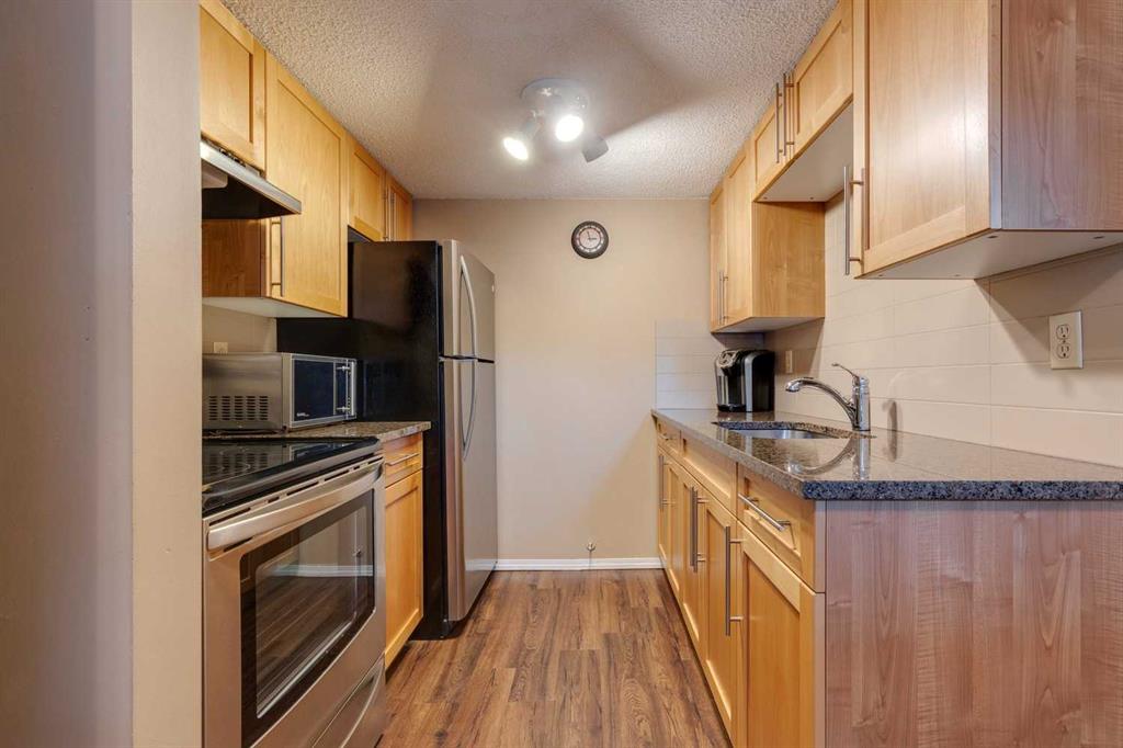 Fourth View of 116, 1055 72 Avenue NW, Huntington Hills, Calgary, Alberta, T2K 5S4