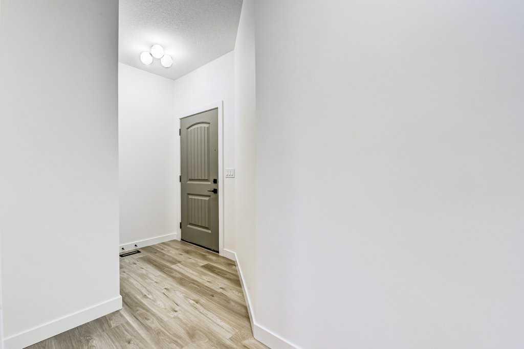 Fifth View of 900 Langholm Drive SE, Lanark, Airdrie, Alberta, T4A 3P7
