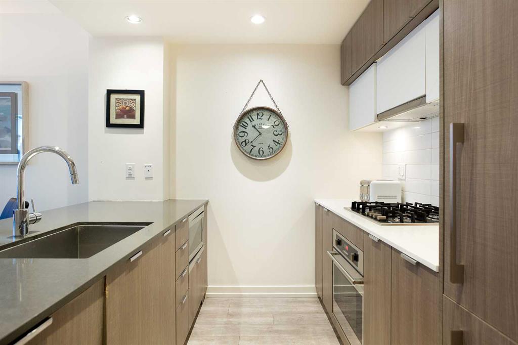 Third View of 205, 51 Waterfront Mews SW, Chinatown, Calgary, Alberta, T2P 0X3