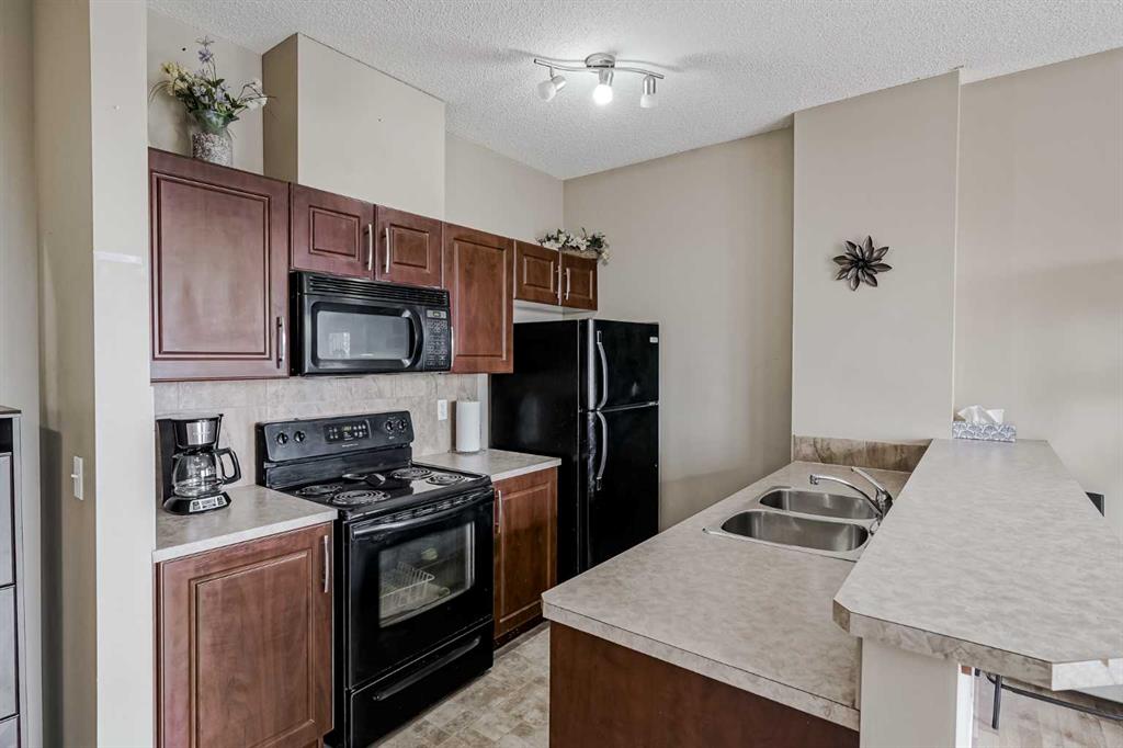 Fourth View of 401, 1727 54 Street SE, Penbrooke Meadows, Calgary, Alberta, T2A 1B7