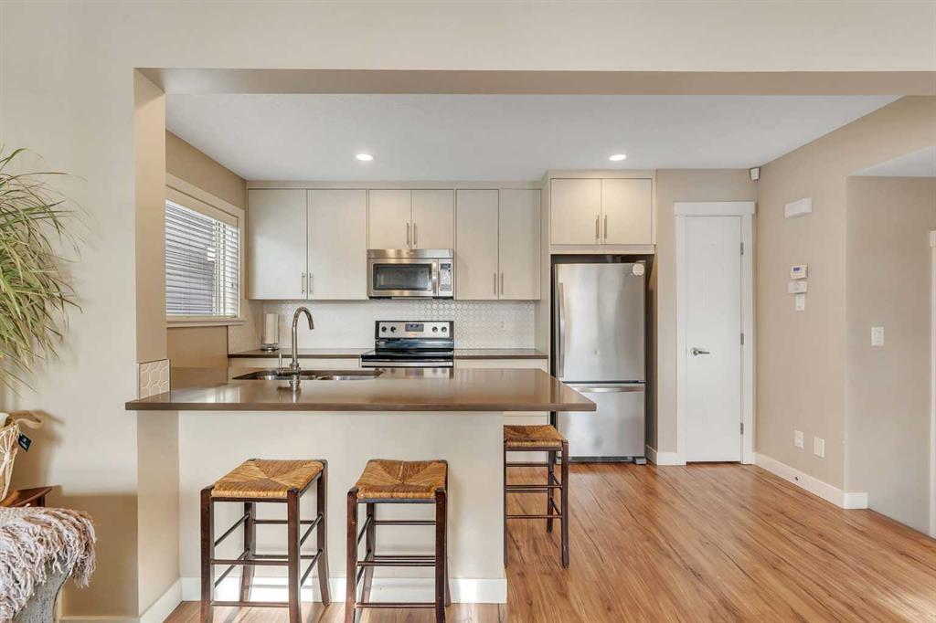 Third View of 201, 50 Belgian Lane , Heartland, Cochrane, Alberta, T4C 0Y5