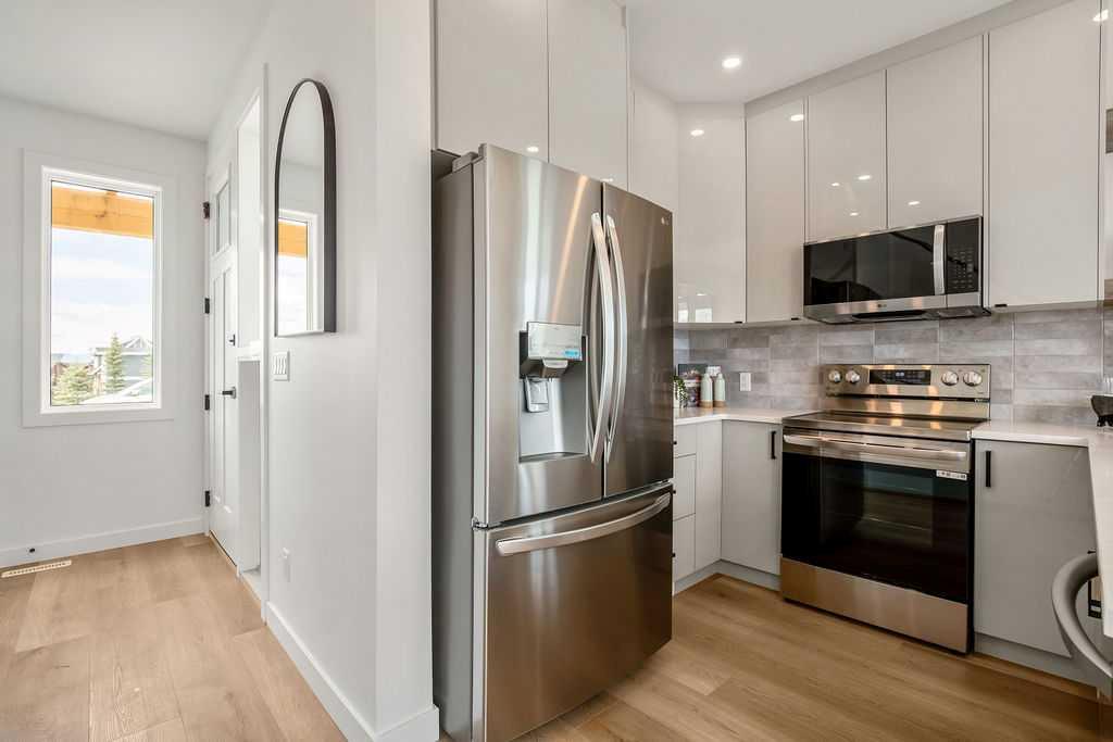 Fourth View of 642 Cottageclub Bend , Cottage Club at Ghost Lake, Rural Rocky View County, Alberta, T4C 1B1