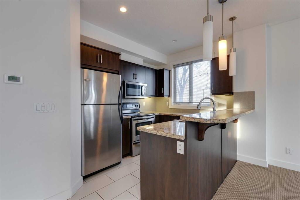 Fourth View of 101, 320 12 Avenue NE, Crescent Heights, Calgary, Alberta, T2E 1A4