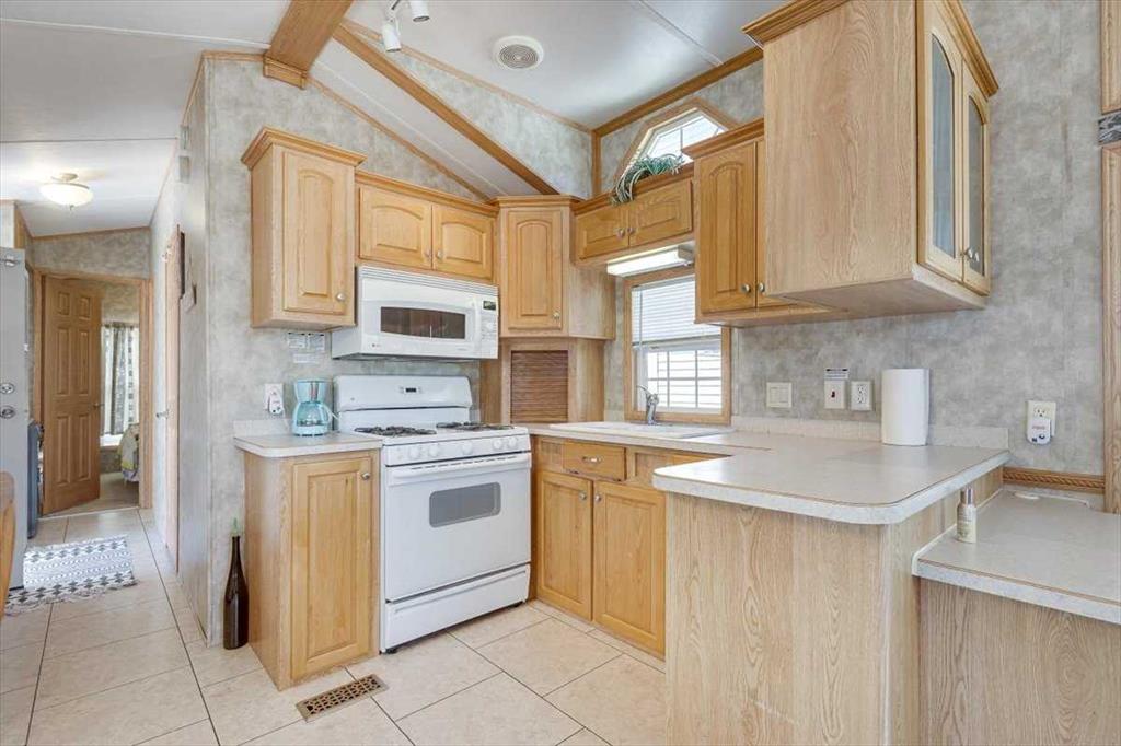 Fourth View of 4032, 25054 South Pine Lake Road  , Whispering Pines, Rural Red Deer County, Alberta, T0M 1R0