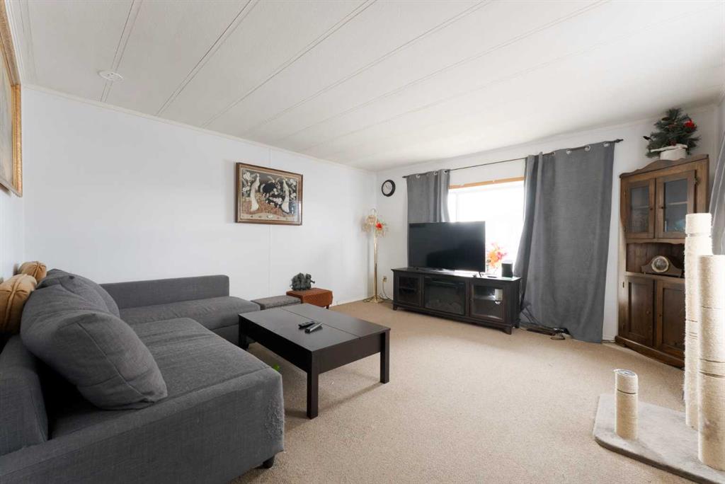 Third View of 302, 6620 17 Avenue SE, Red Carpet, Calgary, Alberta, T2A0W6