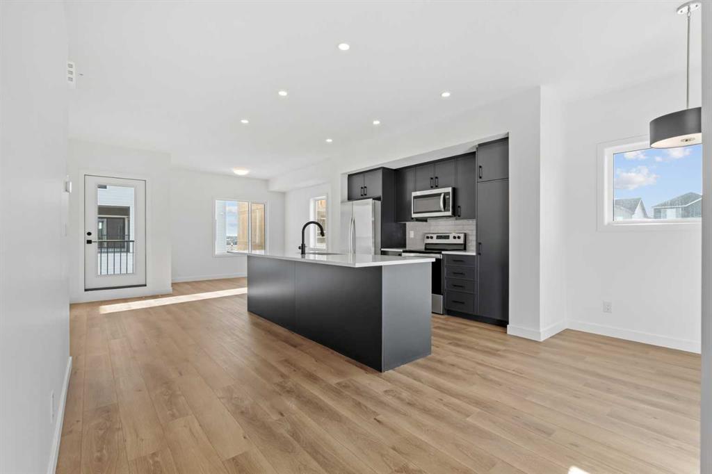 Fourth View of 1115, 25 Wildwoods Court SW, Wildflower, Airdrie, Alberta, T4B 5V7