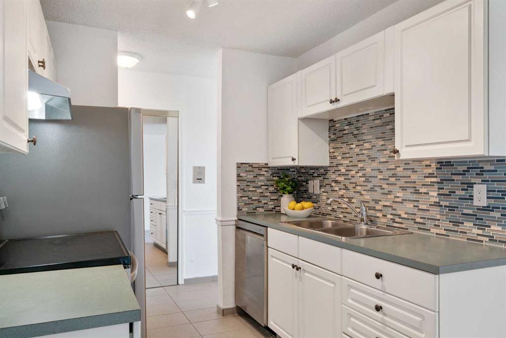 Fifth View of 404, 1113 37 Street SW, Rosscarrock, Calgary, Alberta, T3C 1S5