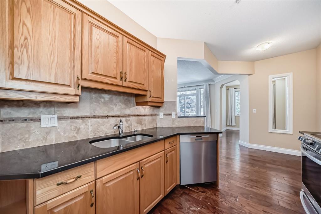 Third View of 203, 12505 Bonaventure Drive SE, Lake Bonavista, Calgary, Alberta, T2J 3S7