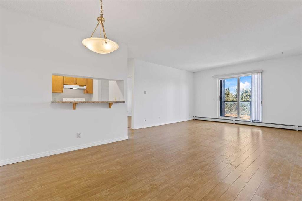 Fourth View of 304, 2022 Canyon Meadows Drive SE, Queensland, Calgary, Alberta, T2J 7H1