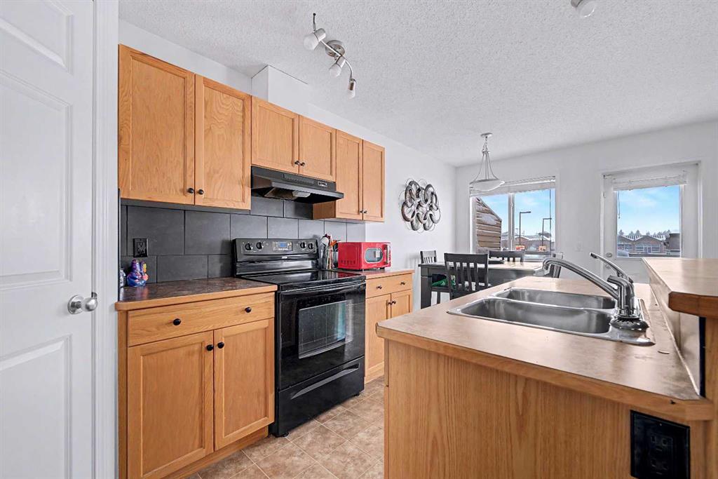 Fifth View of 102, 800 Yankee Valley Boulevard SE, Big Springs, Airdrie, Alberta, T4A 2L1