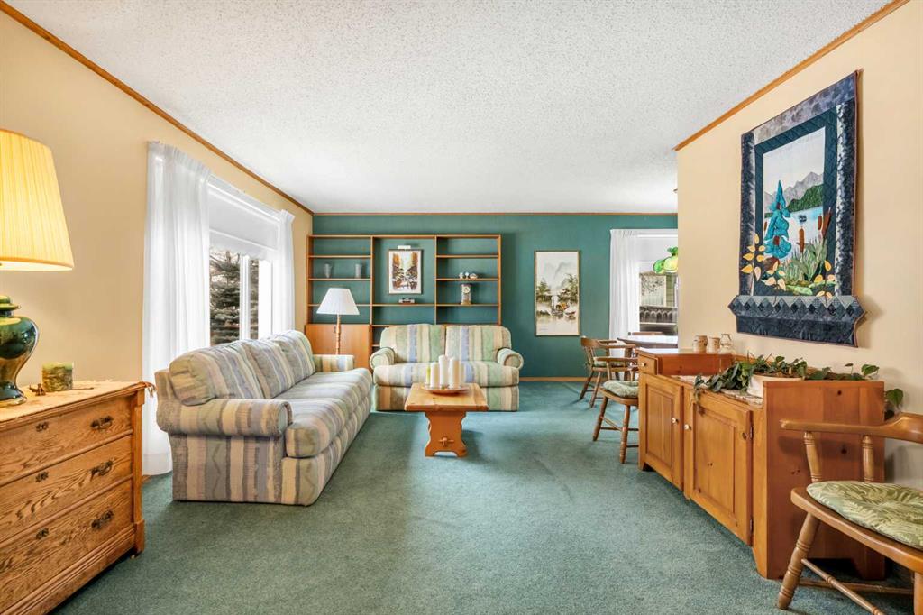 Third View of 128 Parkland Place SE, Parkland, Calgary, Alberta, T2J 3Y6