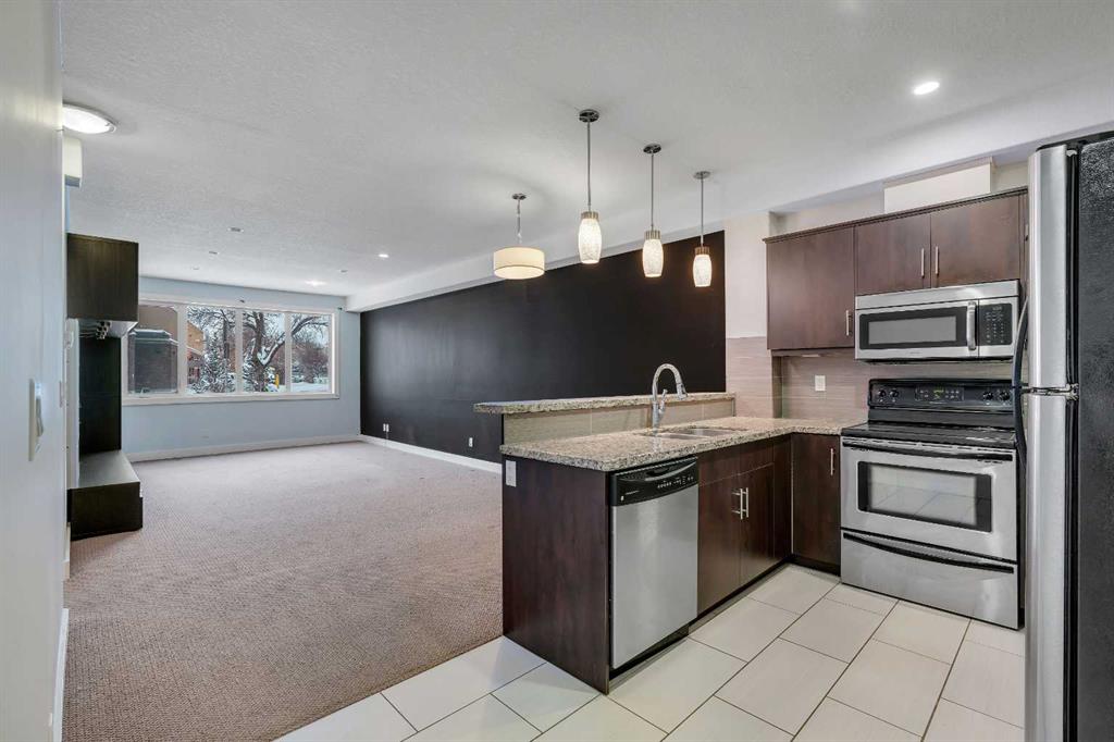 Third View of 105, 320 12 Avenue NE, Crescent Heights, Calgary, Alberta, T2E 1A4