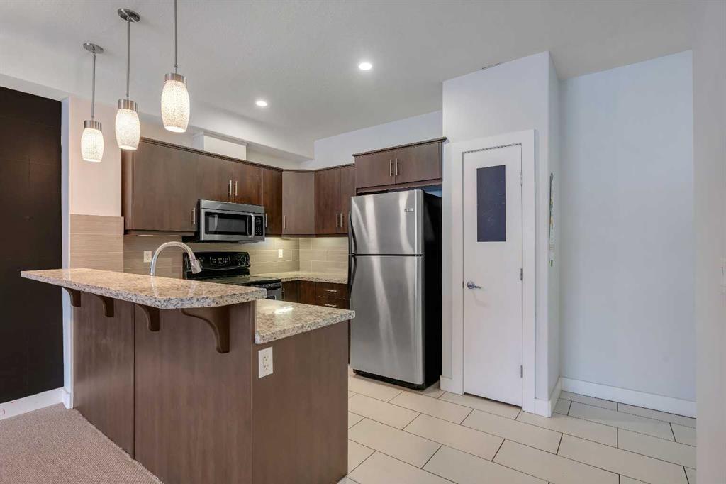 Fourth View of 105, 320 12 Avenue NE, Crescent Heights, Calgary, Alberta, T2E 1A4