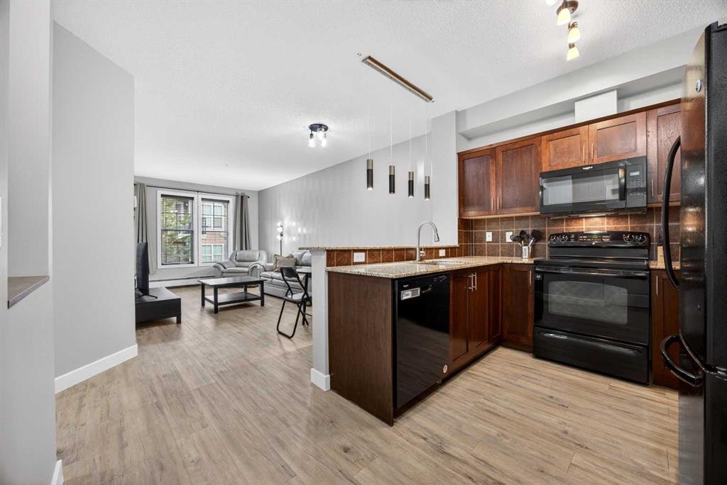Third View of 206, 201 Sunset Drive , Sunset Ridge, Cochrane, Alberta, T4C 0H5