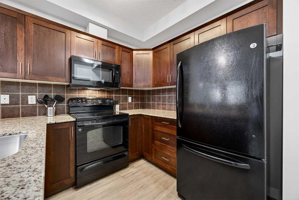 Fifth View of 206, 201 Sunset Drive , Sunset Ridge, Cochrane, Alberta, T4C 0H5