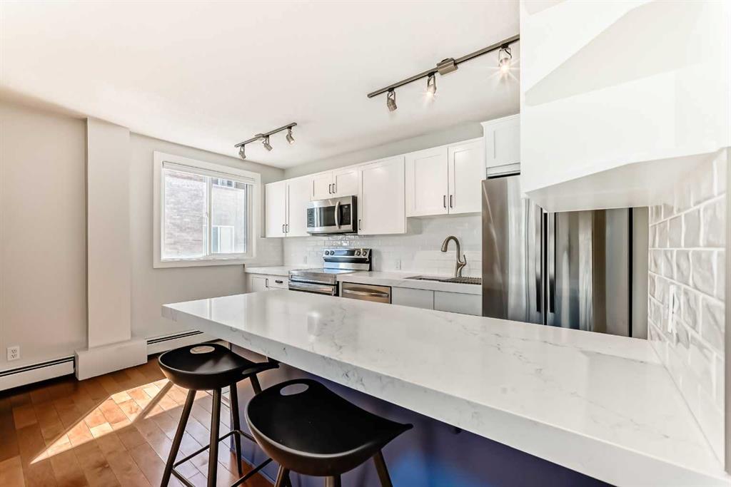 303, 835 18 Avenue SW, A2310273, Alberta,