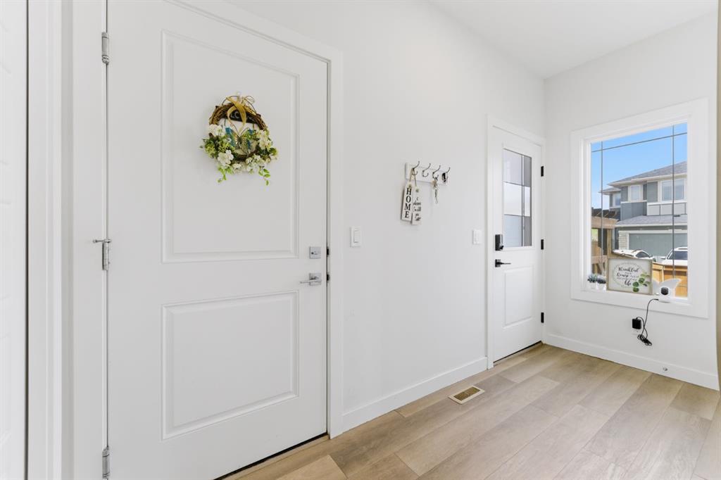 Fourth View of 936 Langholm Drive SE, Lanark, Airdrie, Alberta, T4A 3R2