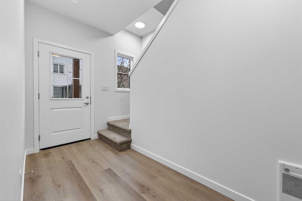 Fourth View of 106, 40 Creekside Way SW, Pine Creek, Calgary, Alberta, T2X 6E2