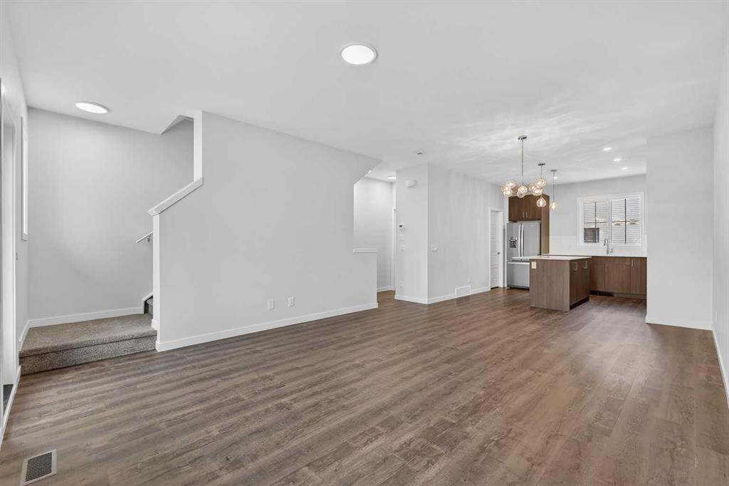 Fourth View of 105, 40 Creekside Way SW, Pine Creek, Calgary, Alberta, T2X 6E2