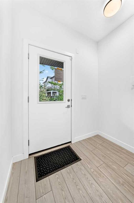 Fifth View of 802, 335 Creekside Boulevard SW, Pine Creek, Calgary, Alberta, T2X 5L1