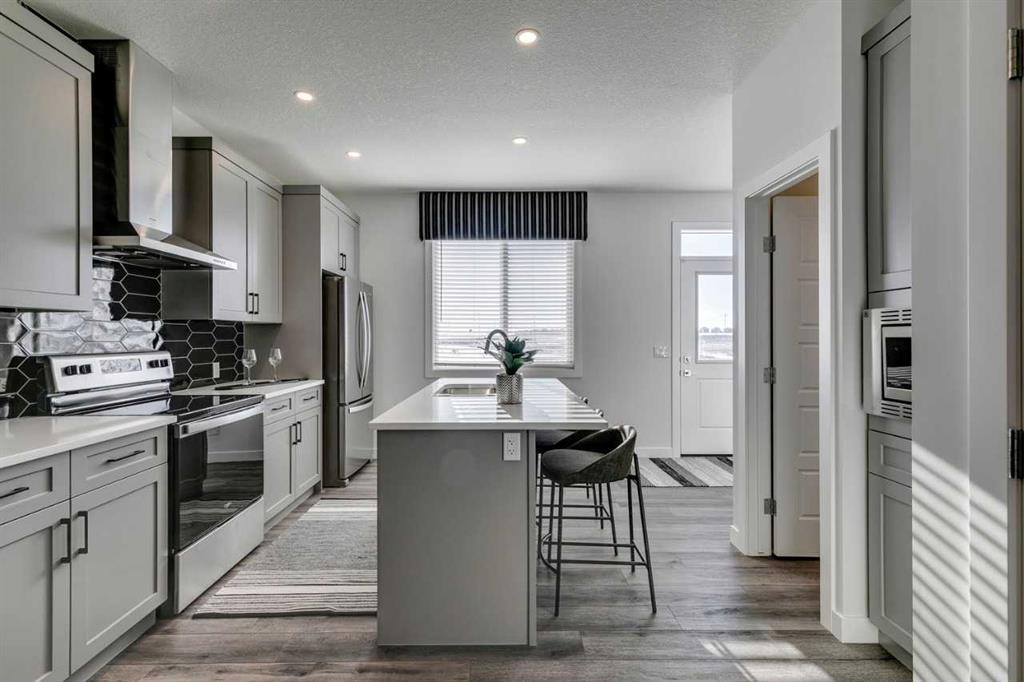 Fourth View of 148 Snowberry Common SE, Ricardo Ranch, Calgary, Alberta, T3M4G7