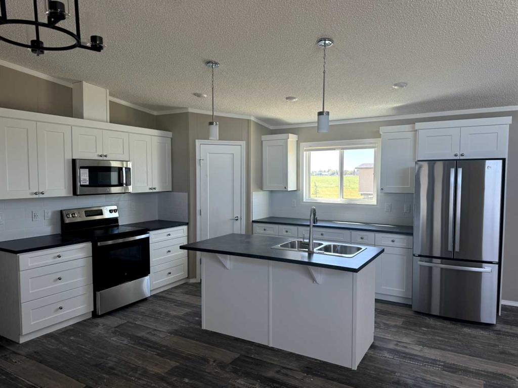 Fifth View of 7037 & 7049 48 Street , NONE, Taber, Alberta, T1G 0G7