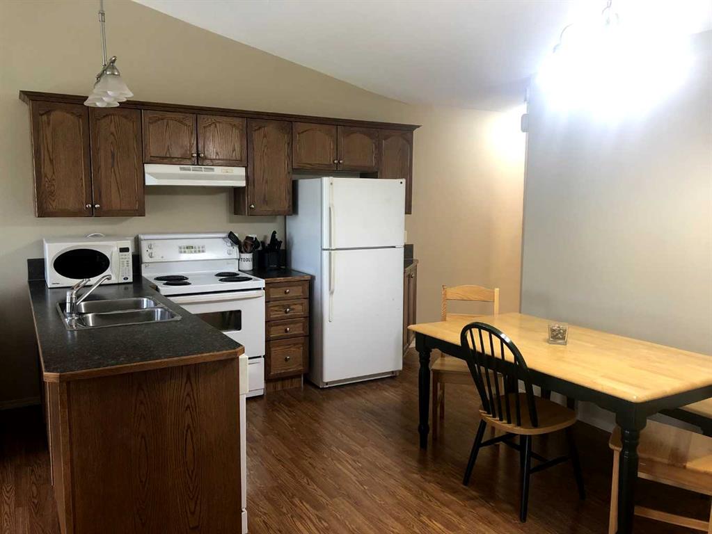 Third View of 7017 Deer Street , College Heights, Lacombe, Alberta, T4L 1Y9