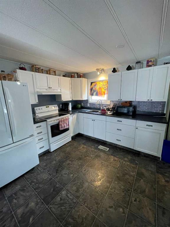 Fourth View of 69, 1190 15 Avenue , NONE, Didsbury, Alberta, T0M 0W0