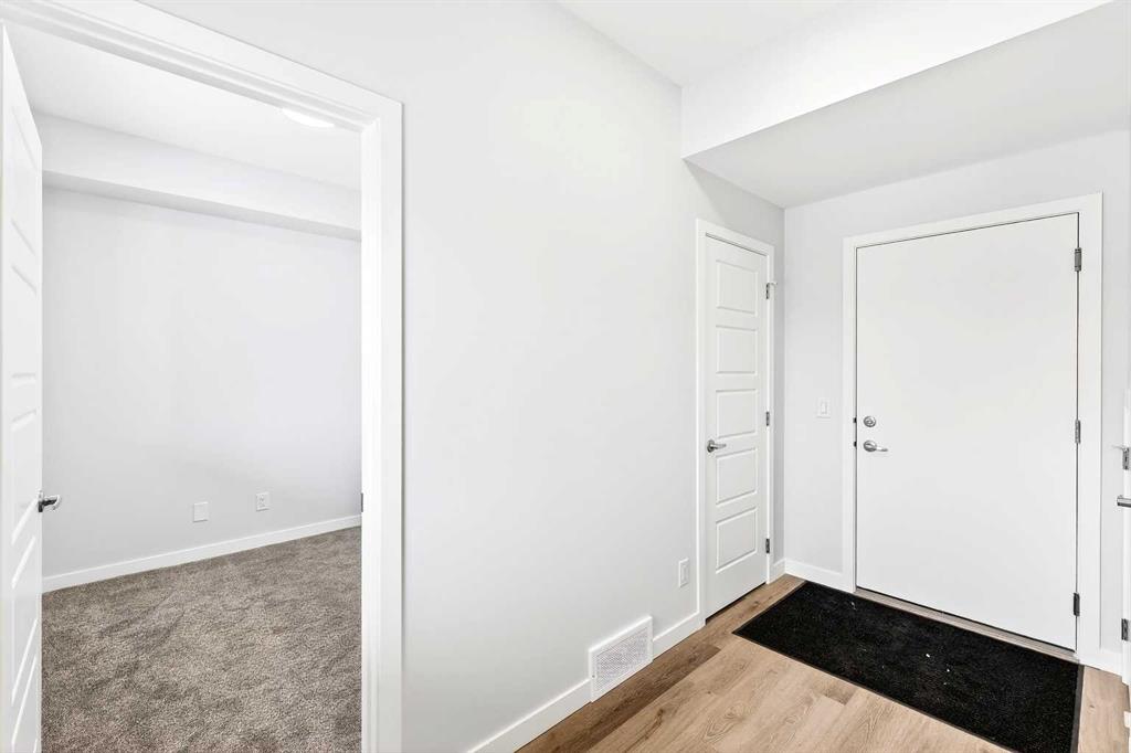 Fifth View of 302, 40 Creekside Way SW, Pine Creek, Calgary, Alberta, T2X 6E2