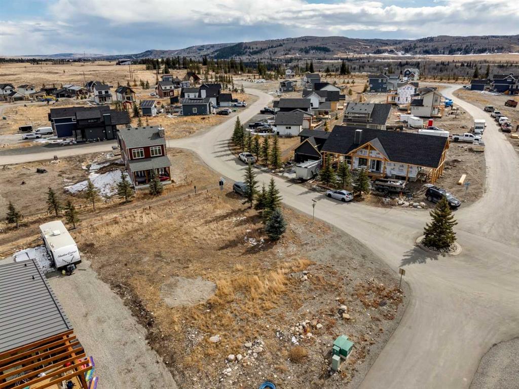 Fourth View of 130 Cottageclub Court , Cottage Club at Ghost Lake, Rural Rocky View County, Alberta, T4C1B1