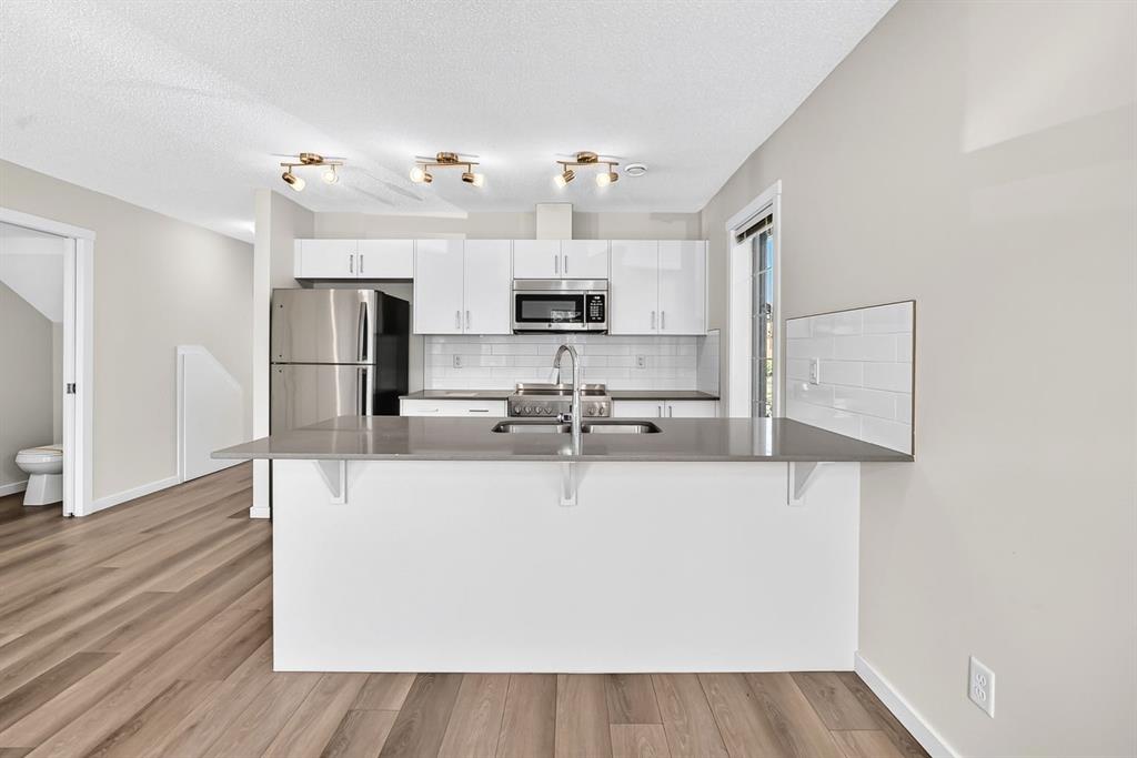 Fourth View of 428 Cranbrook Square SE, Cranston, Calgary, Alberta, T3M 3K9