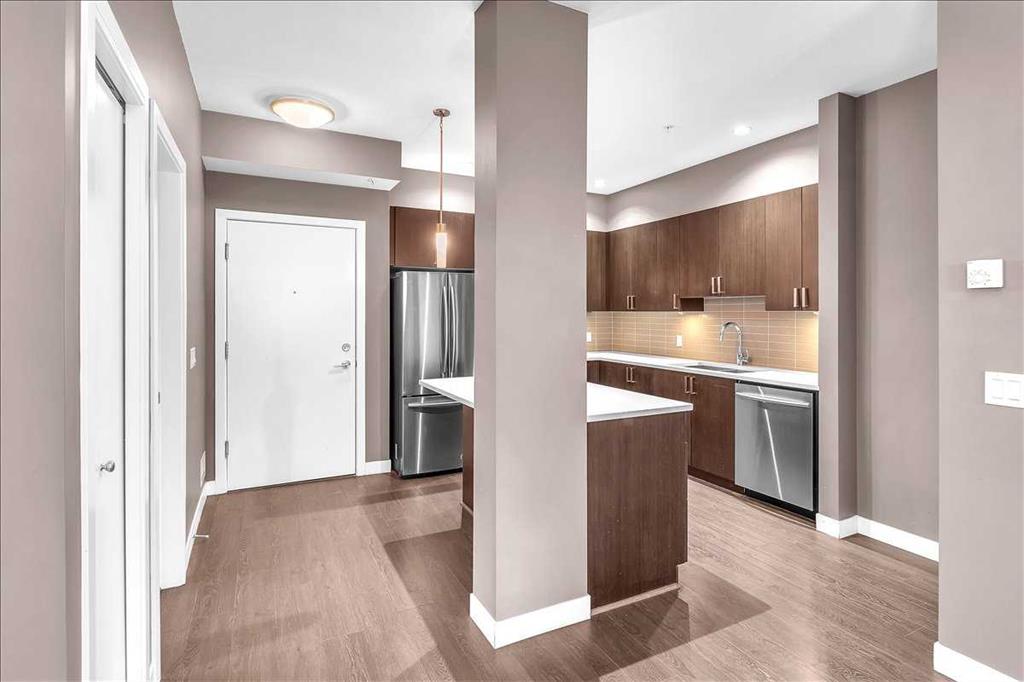 Fourth View of 210, 22 Auburn Bay Link SE, Auburn Bay, Calgary, Alberta, T3M 1Z8