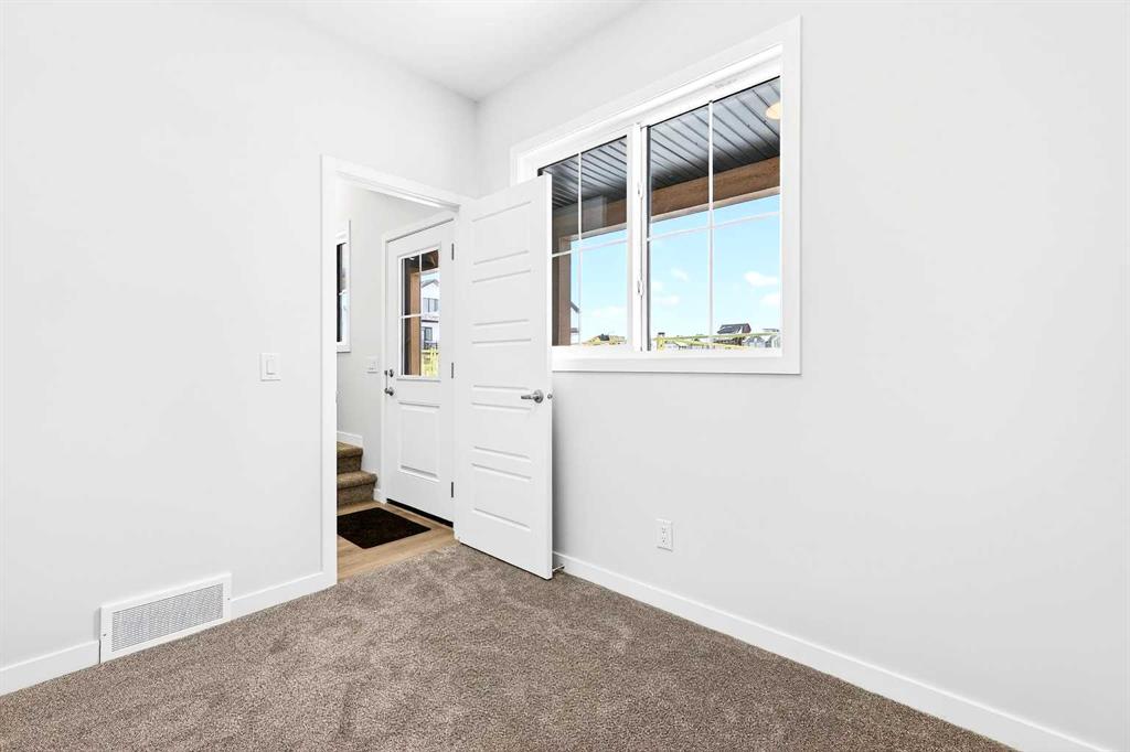 Fourth View of 201, 40 Creekside Way SW, Pine Creek, Calgary, Alberta, T2X 6E2