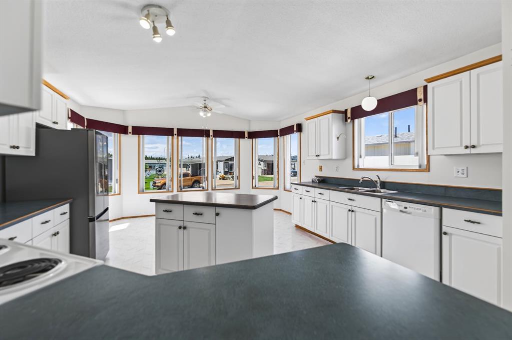 Fourth View of 327, 37534 England Way , Waskasoo Estates, Rural Red Deer County, Alberta, T4S2C3