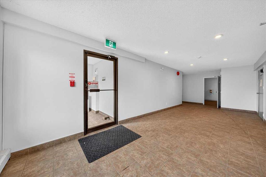 Fourth View of 203, 1712 38 Street SE, Forest Lawn, Calgary, Alberta, T2A 1H1