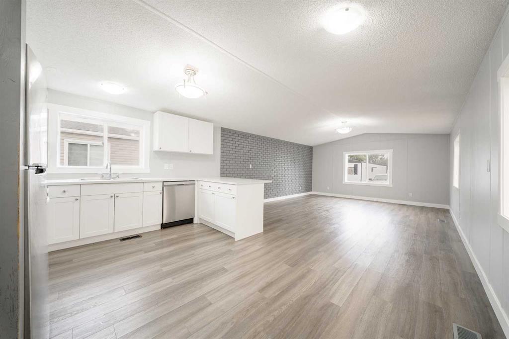 Third View of 215, 6220 17 Avenue SE, Red Carpet, Calgary, Alberta, T2A 0W6