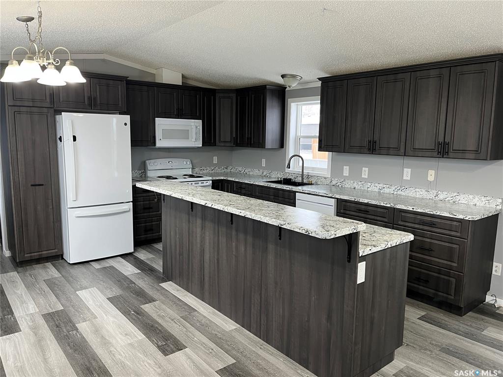 Second View of 341 10th Avenue S, Weyburn, Saskatchewan, S4H 2R8