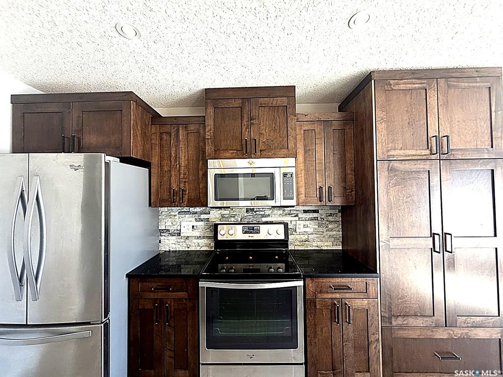 Second View of 103 Plains Circle, Pilot Butte, Saskatchewan, S0G 3Z0