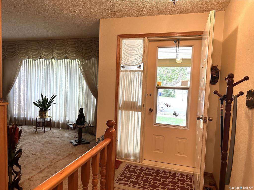 Fifth View of 213 5th Street, Weyburn, Saskatchewan, S4H 0Z4