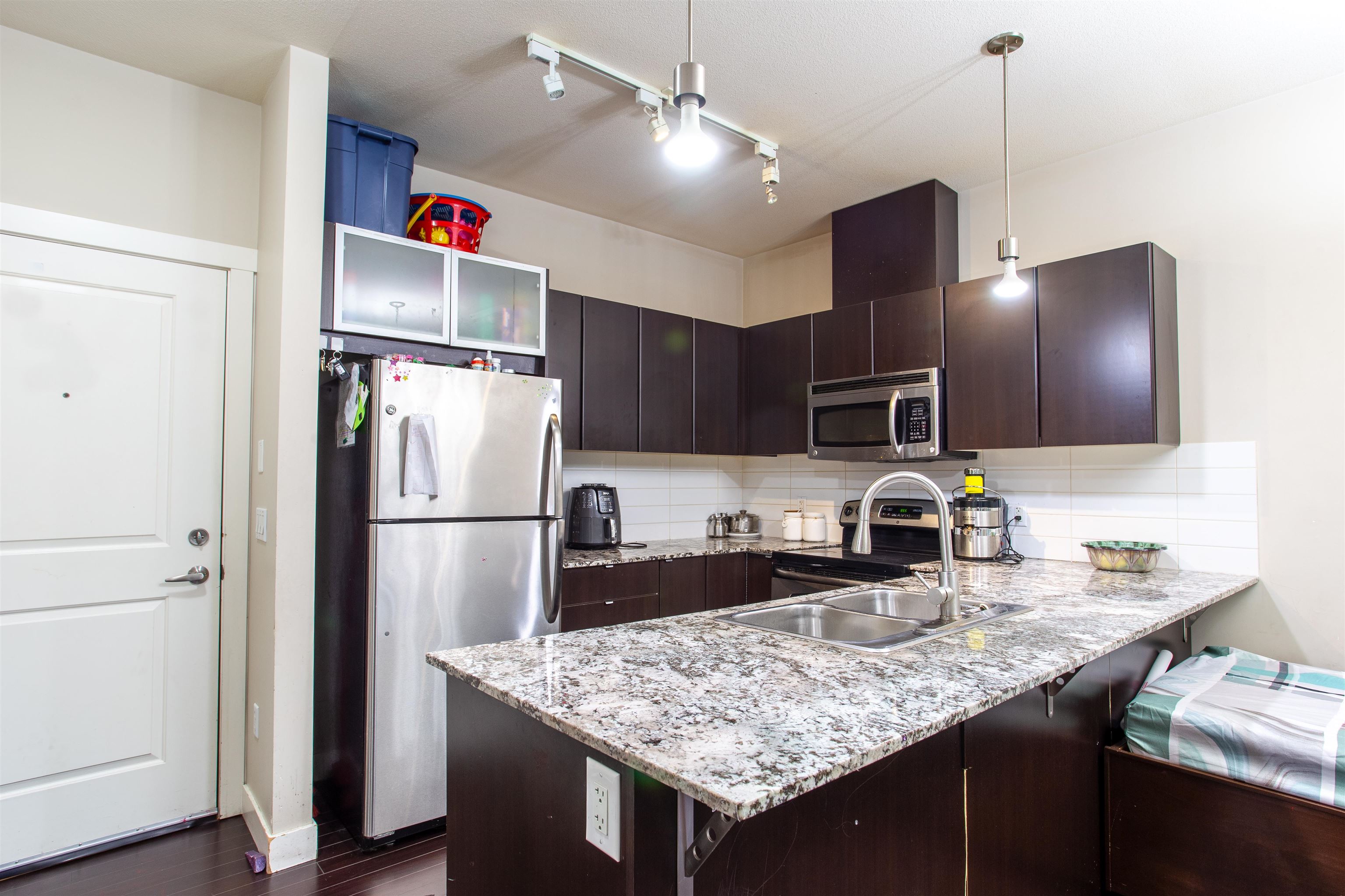 MLS® listing #R3074141 for sale located at 409 9655 KING GEORGE BOULEVARD