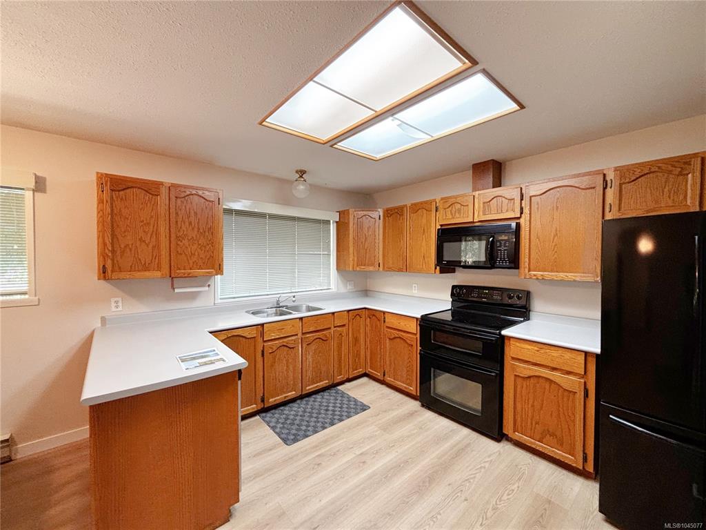 Third View of 352 Nootka Dr, Gold River, BC, V0P 1G0